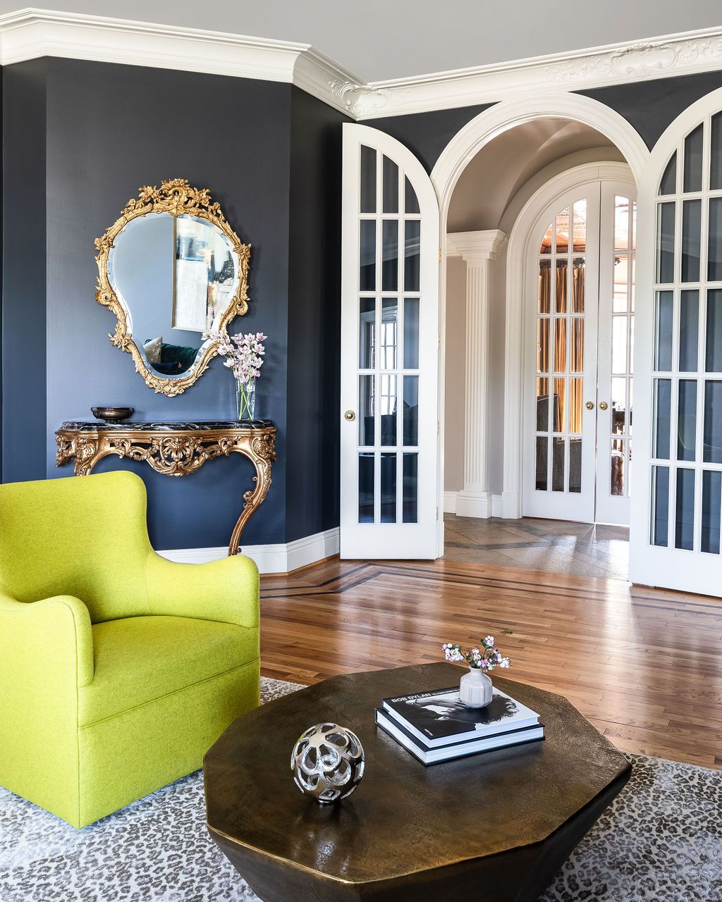 arched-doors-ornate-mirror-leopard-rug
