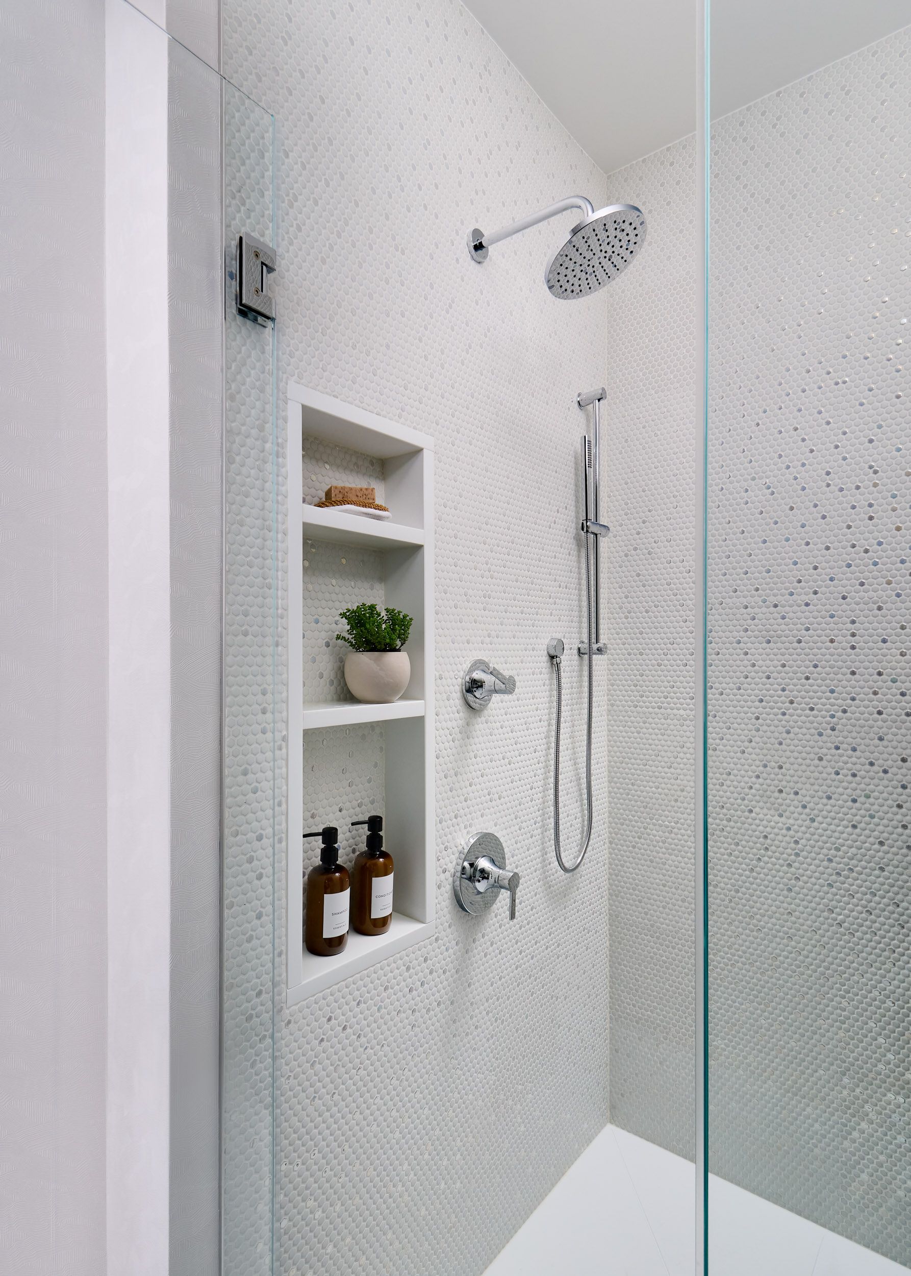 walk-in-shower-with-penny-tile-and-niche