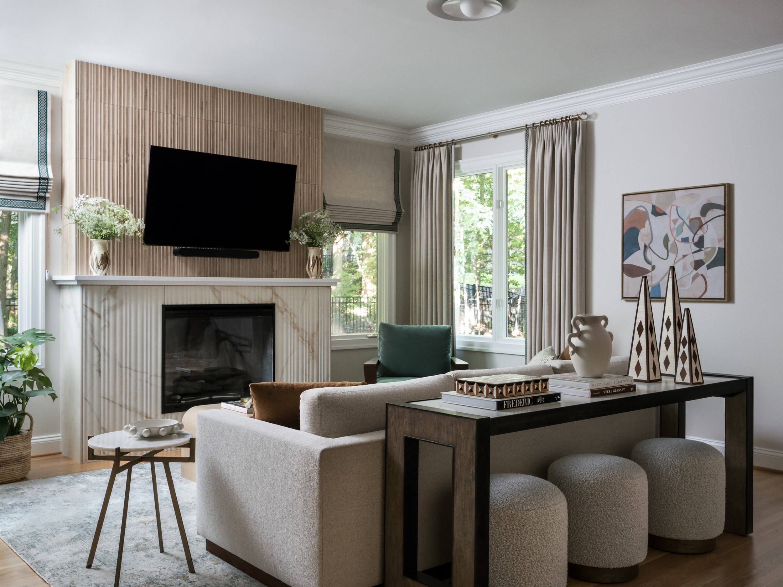 lp-co-family-room-with-roman-shades-and-drapery